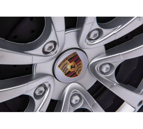 Дитяча акумуляторна машинка Porsche Cayenne S Чорна Дитяча акумуляторна машинка Porsche Cayenne S Чорна